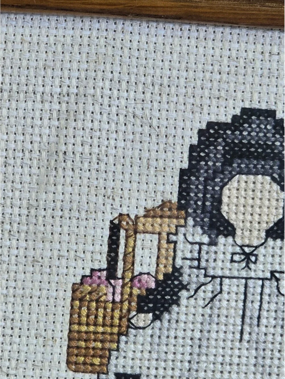 Country Cross stitch framed 9.5x7.5 has some discolorations.